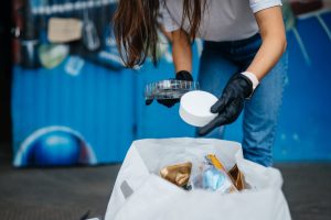 young woman sorting garbage concept recycling zero waste